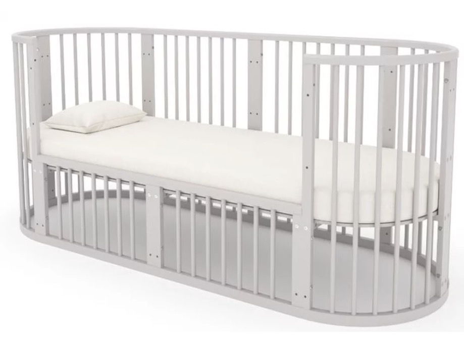 Круглая кроватка для новорожденного трансформируется в большую детскую кроватку
