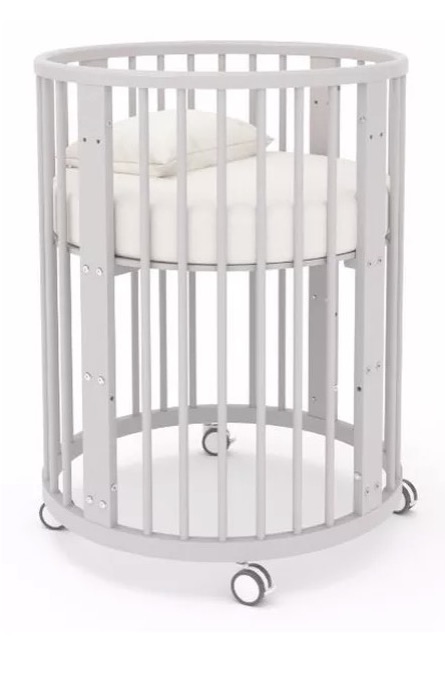 Круглая кроватка для новорожденного на колесиках