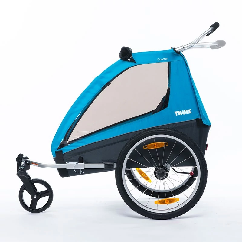Велосипедный прицеп Thule Coaser XT (Тул Коазер Икс-Т) рассчитан для двоих детей активных родителей