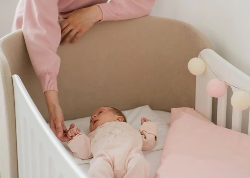 Детская кроватка-трансформер для новорожденных Ellipse KIDI Soft имеет регулируемую высоту ложа